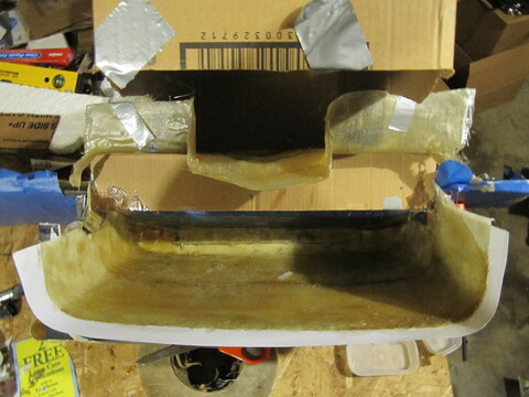 Fill mold with fiberglass